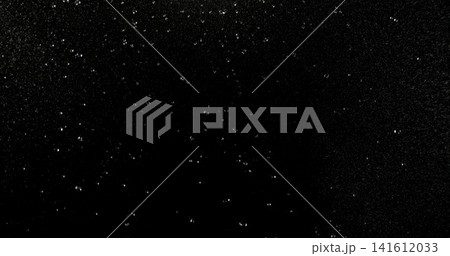 High speed close up of falling rain droplets isolated on a black background creating a realistic weather VFX overlay perfect for cinematic compositing visual effects motion graphics and atmospheric 141612033
