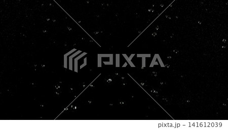 High speed close up of falling rain droplets isolated on a black background creating a realistic weather VFX overlay perfect for cinematic compositing visual effects motion graphics and atmospheric High speed close up of falling rain droplets isolated on a black background creating a realistic weather VFX overlay perfect for cinematic compositing visual effects motion graphics and atmospheric 141612039