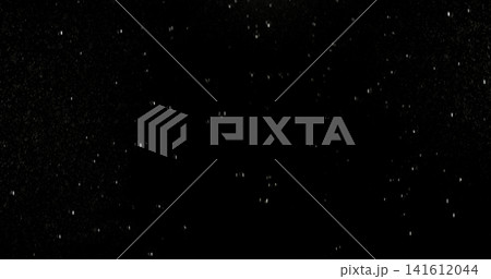 High speed close up of falling rain droplets isolated on a black background creating a realistic weather VFX overlay perfect for cinematic compositing visual effects motion graphics and atmospheric 141612044