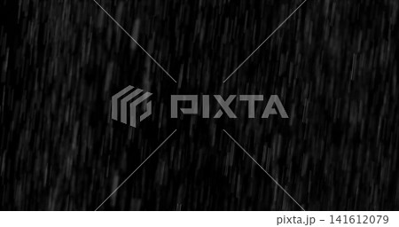 Motion blurred rain streaks isolated on a black background creating a realistic weather overlay with dynamic falling droplets perfect for visual effects compositing graphic design and atmospheric 141612079