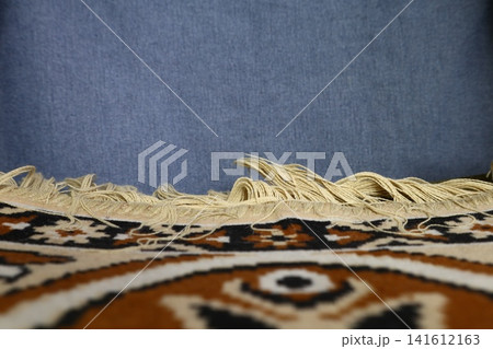 A collage of denim and carpet. A collage of denim and carpet. 141612163