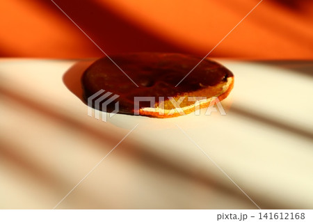 Slice of orange with chocolate. Slice of orange with chocolate. 141612168
