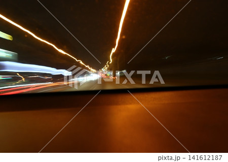Abstract image of multicolored lights in the city. Abstract image of multicolored lights in the city. 141612187