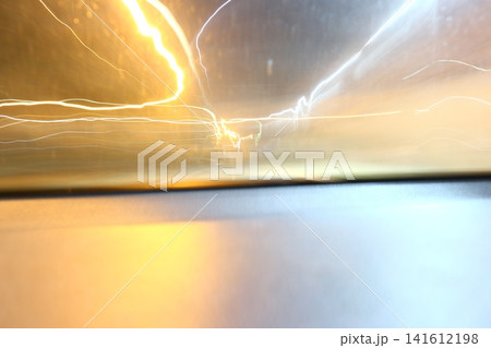 Abstract image of multicolored lights in the city. Abstract image of multicolored lights in the city. 141612198