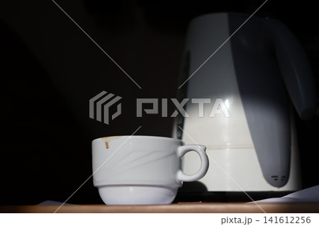 Blotch of coffee on a cup. Blotch of coffee on a cup. 141612256