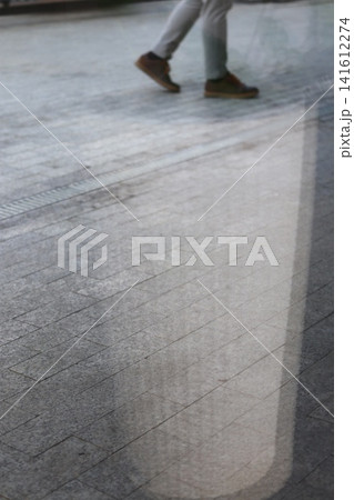 The reflection of the interior on the paving slabs. The reflection of the interior on the paving slabs. 141612274