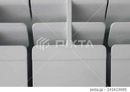 The top of the white aluminum radiator. The top of the white aluminum radiator. 141613095