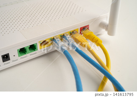 Ethernet cable with wireless router connect to internet service provider network. Ethernet cable with wireless router connect to internet service provider network. 141613795