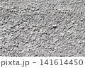 background texture of exposed aggregate concrete surface with small stones and grey cement 141614450