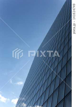 Modern architecture and cloudy blue sky on background 141614749