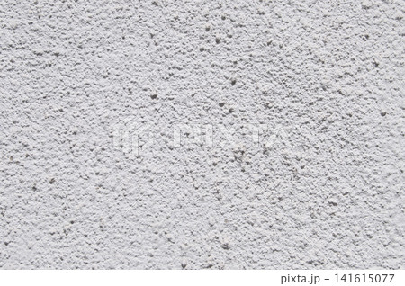 A white wall texture background. Grain wall backdrop 141615077