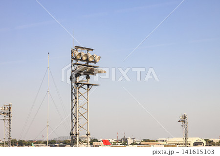exterior lamp posts, spotlight pole in airport. 141615103