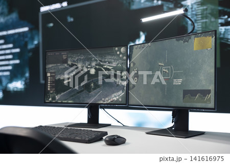 Close up of screens in military command center detecting incoming ballistic missiles. Surveillance interface on PC monitoring enemy movement during defensive operation 141616975