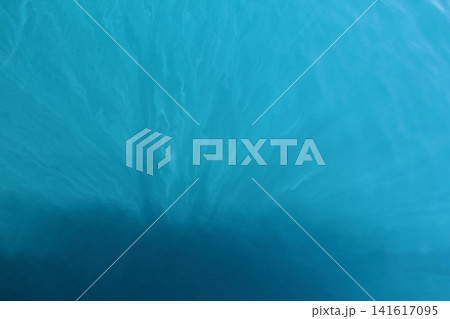 Background sea, ocean. Ride the waves in the ocean. Sea waves. Background of sea foam wave. Log on the seashore, ocean. 141617095