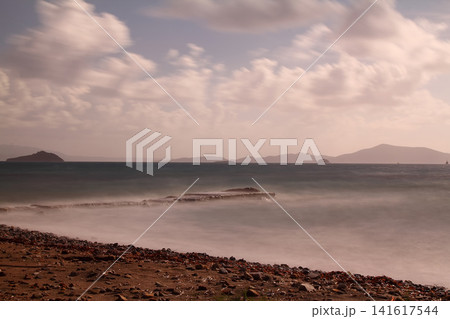 sunset on the beach. Seaside town of Turgutreis and spectacular sunsets. Selective Focus. Long Exposure shoot. tranquility scene. 141617544