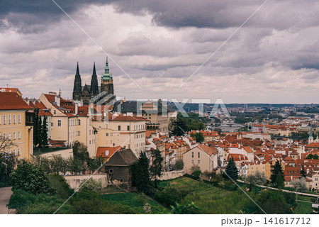 Panoramic view of Prague filmed from the hill near Strahov Monastery. Historic city skyline with red 141617712
