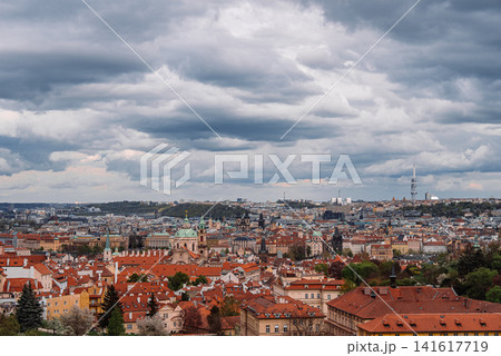 View of Prague captured from Strahov Hill with dramatic clouds move across the sky and changing 141617719