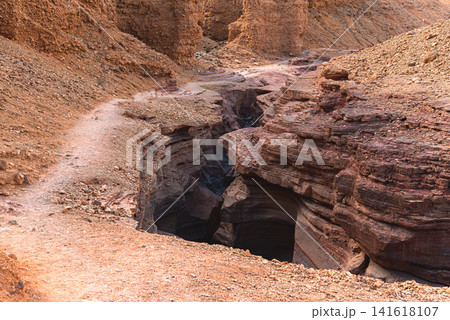 Desert hiking trail along Red canyon slot gorge near Eilat Israel (black path) 141618107