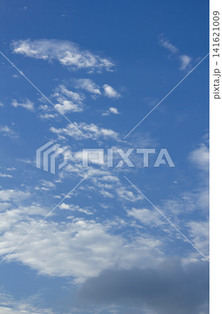 It is a blue sky with cirrocumulus clouds. 141621009
