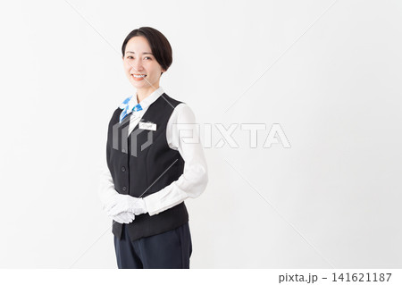 制服を着たアテンダントの女性 旅行イメージ 制服を着たアテンダントの女性 旅行イメージ 141621187
