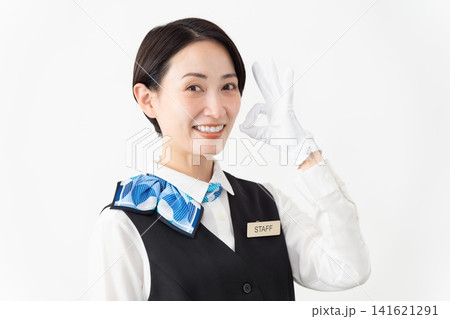 制服を着たアテンダントの女性 旅行イメージ 制服を着たアテンダントの女性 旅行イメージ 141621291