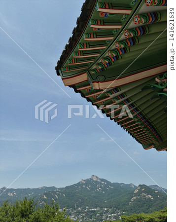 A Seoul landscape featuring mountains and the sky. A Seoul landscape featuring mountains and the sky. 141621639