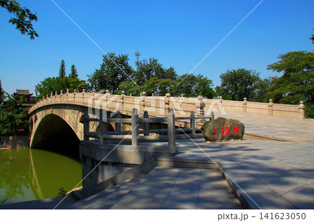 Ancient Chinese Stone Bridge in Scenic Park Under Blue Sky 141623050
