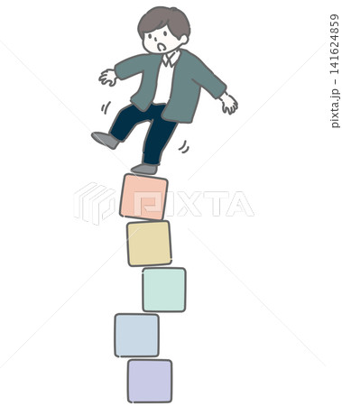 足元のブロックが崩れて落ちそうな男性  141624859