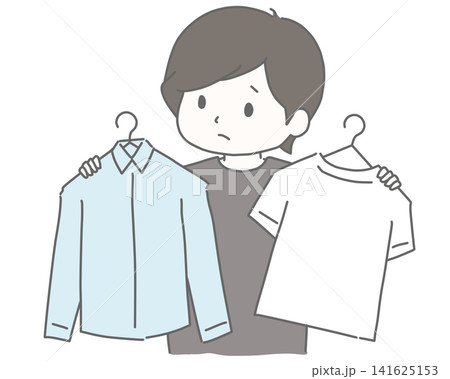 服装選びに迷う男性  141625153
