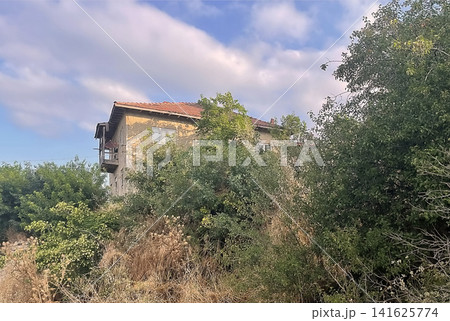 Century old village house in Harmankoy, Bilecik, nestled in green nature with rustic textures and timeless rural charm. Century old village house in Harmankoy, Bilecik, nestled in green nature with rustic textures and timeless rural charm. 141625774