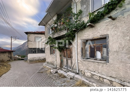 Century old village house in Harmankoy, Bilecik, nestled in green nature with rustic textures and timeless rural charm. Century old village house in Harmankoy, Bilecik, nestled in green nature with rustic textures and timeless rural charm. 141625775