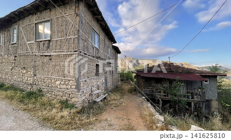 Century old village house in Harmankoy, Bilecik, nestled in green nature with rustic textures and timeless rural charm. Century old village house in Harmankoy, Bilecik, nestled in green nature with rustic textures and timeless rural charm. 141625810