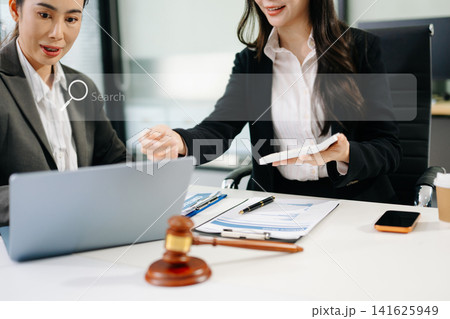 Searching Browsing Internet Data Information Networking Concept with blank search bar.justice and law concept.Male judge in a courtroom with the gavel,working with digital tablet computer. Searching Browsing Internet Data Information Networking Concept with blank search bar.justice and law concept.Male judge in a courtroom with the gavel,working with digital tablet computer. 141625949