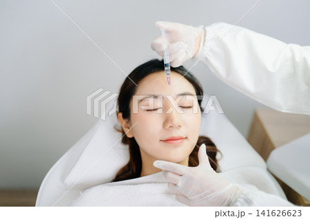 Professional beauty clinic treatment with facial injection, skincare, anti-aging and aesthetic care. Clean, sterile Professional beauty clinic treatment with facial injection, skincare, anti-aging and aesthetic care. Clean, sterile 141626623