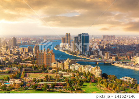 Panoramic aerial top view of Cairo cityscape along the Nile River at sunset, Egypt Panoramic aerial top view of Cairo cityscape along the Nile River at sunset, Egypt 141627140