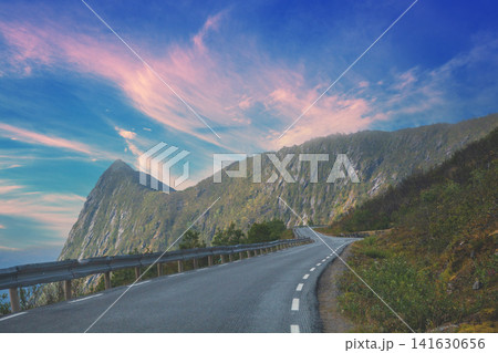 Narrow winding mountain road along the fjord. Senia Island, Norway, Europe 141630656