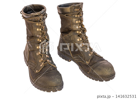 Worn Dark Brown Combat Boots on White Background Worn Dark Brown Combat Boots on White Background 141632531