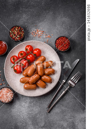 Chicken or pork grilling sausages with garlic, salt, and spices. Grilling sausages Chicken or pork grilling sausages with garlic, salt, and spices. Grilling sausages 141632698
