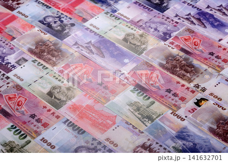 Taiwan, Taiwanese paper banknotes and coins, dollars of various denominations. Taiwanese dollars Taiwan, Taiwanese paper banknotes and coins, dollars of various denominations. Taiwanese dollars 141632701