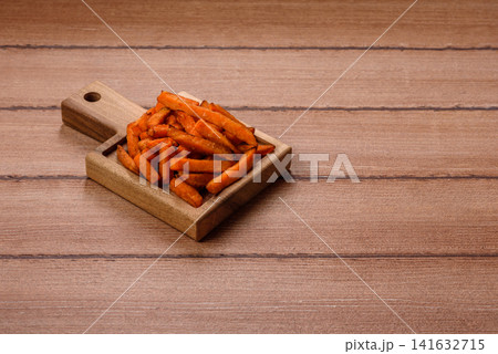 Seasoned sweet potato fries with sauce, fast food. Sweet potato fries Seasoned sweet potato fries with sauce, fast food. Sweet potato fries 141632715