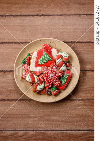Gingerbread as a Christmas staple, sweet biscuits for the holiday table. Gingerbread as a backdrop Gingerbread as a Christmas staple, sweet biscuits for the holiday table. Gingerbread as a backdrop 141632727