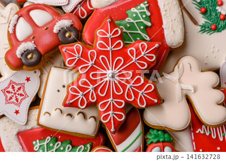 Gingerbread as a Christmas staple, sweet biscuits for the holiday table. Gingerbread as a backdrop Gingerbread as a Christmas staple, sweet biscuits for the holiday table. Gingerbread as a backdrop 141632728