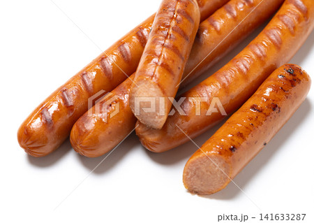 Grilled Frankfurt sausages isolated on white background Grilled Frankfurt sausages isolated on white background 141633287