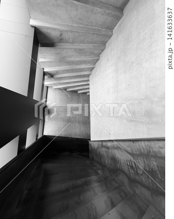 Monochrome concrete staircase with strong geometric lines Monochrome concrete staircase with strong geometric lines 141633637