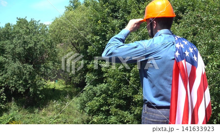 Construction worker and American flag Construction worker and American flag 141633923