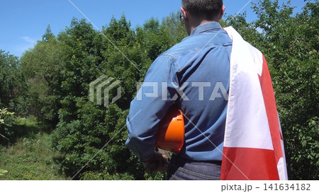 Construction worker and Canadian flag Construction worker and Canadian flag 141634182