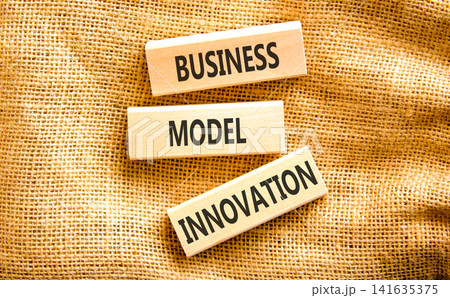 Business model innovation words symbol. Concept words Business model innovation on beautiful wooden blocks. Beautiful canvas background. Business model innovation concept. Copy space. Business model innovation words symbol. Concept words Business model innovation on beautiful wooden blocks. Beautiful canvas background. Business model innovation concept. Copy space. 141635375