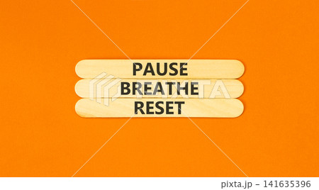 Pause breathe reset words symbol. Concept words Pause breathe reset on beautiful wooden sticks. Beautiful orange background. Business support motivational and pause breathe reset concept. Copy space. Pause breathe reset words symbol. Concept words Pause breathe reset on beautiful wooden sticks. Beautiful orange background. Business support motivational and pause breathe reset concept. Copy space. 141635396