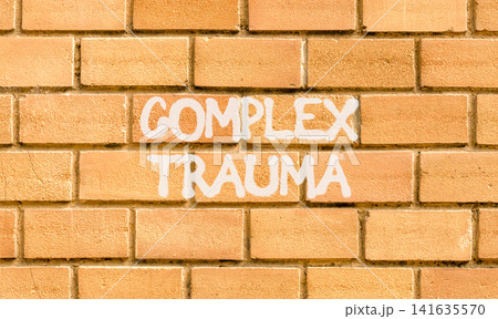 Complex trauma words symbol. Concept words Complex trauma on beautiful brick wall. Beautiful brick wall background. Psychological complex trauma support concept. Copy space. Complex trauma words symbol. Concept words Complex trauma on beautiful brick wall. Beautiful brick wall background. Psychological complex trauma support concept. Copy space. 141635570