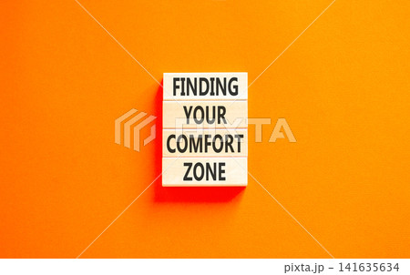 Finding your comfort zone words symbol. Concept words Finding your comfort zone on beautiful wooden blocks. Beautiful orange background. Psychological finding your comfort zone concept. Copy space. Finding your comfort zone words symbol. Concept words Finding your comfort zone on beautiful wooden blocks. Beautiful orange background. Psychological finding your comfort zone concept. Copy space. 141635634